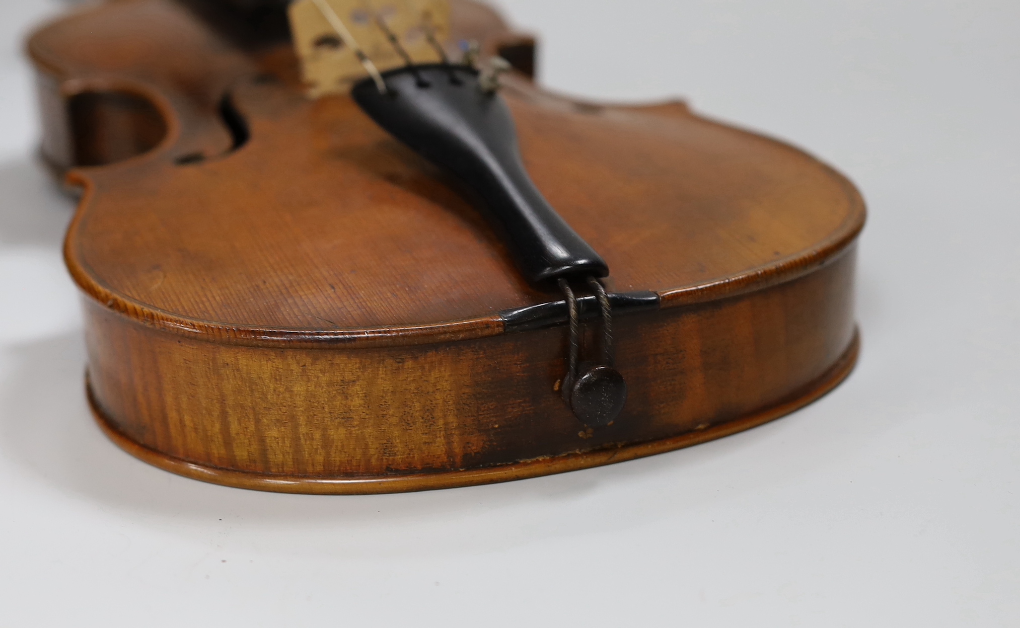 A Vuillaume violin with a bow, in case, back measures 36cm excl button